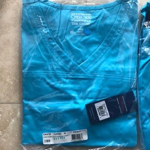 Brand new Cherokee set of turquoise scrubs.